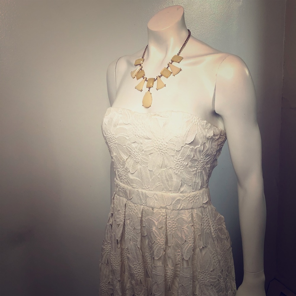 White dress with white lace overlay